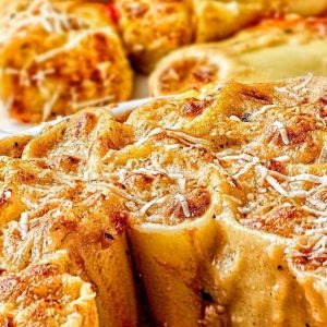Paccheri gratinati con ragù di pesce pregiato: il mare incontra il Natale