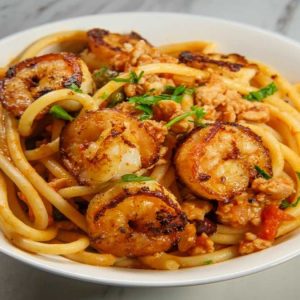 Spaghettone al forno con ragu di crostacei