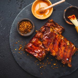 Costine di maiale con salsa al miele e agrumi