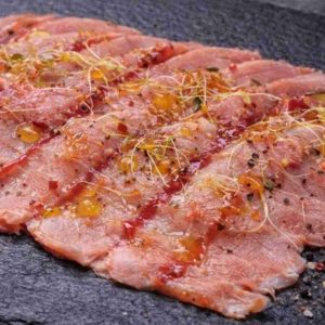 Carpaccio tiepido di lonzino marinato agli agrumi